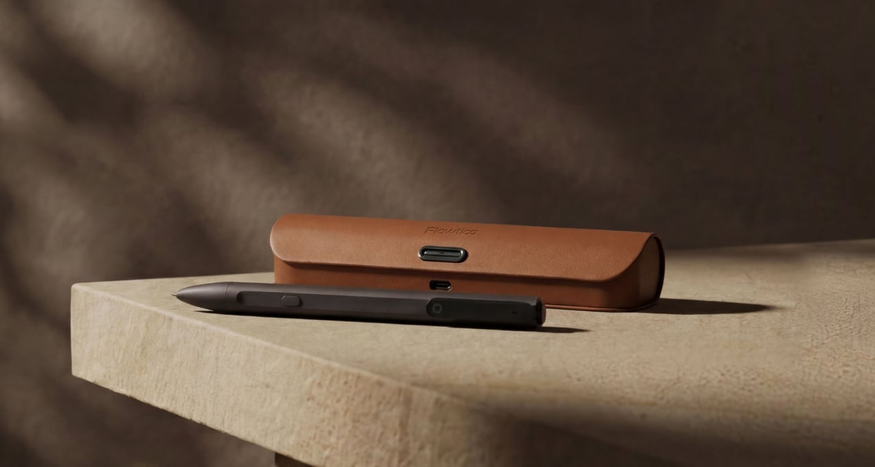 Flowtica Scribe pen and leather case on a stone desk